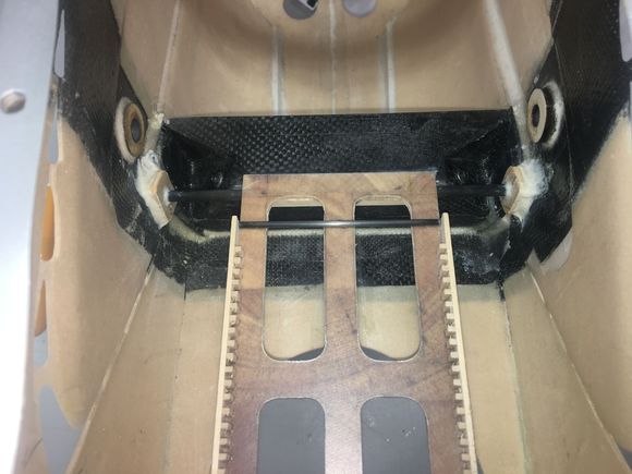 Rear of the battery tray glued to the CF tube and LG box.  
The Battery tray with the 2 CF tubes weighed 45 gms (no glue or lite ply supports)  Maybe a bit heavier than needed but I am a little gun shy about making this part too light and risk sending a battery pack or pack with tray into orbit.  