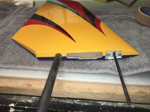 Lower portion of stab cutout relieved to make room for the charge connector