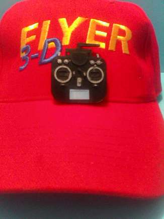 This mini transmitter mounts with a very strong magnet so you don't have to make holes in your hat.  Great Christmas present for you flying buddies or club drawings too!