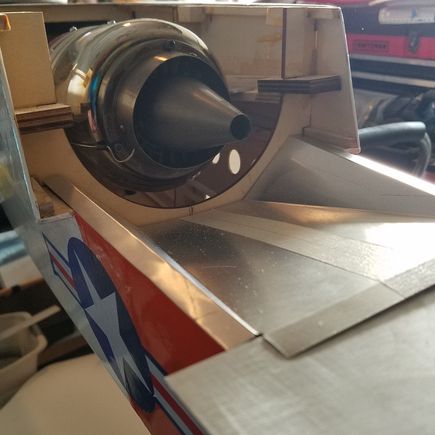 Flashing metal used and will be two piece rear cover.  The rear bottom cover plate fits without having to cut out for the engine.