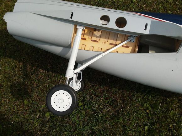The main gear is mounted solid, and is setup to rotate 90 degrees as it fits up into the wheel well, all the gear doors are included in the kit.