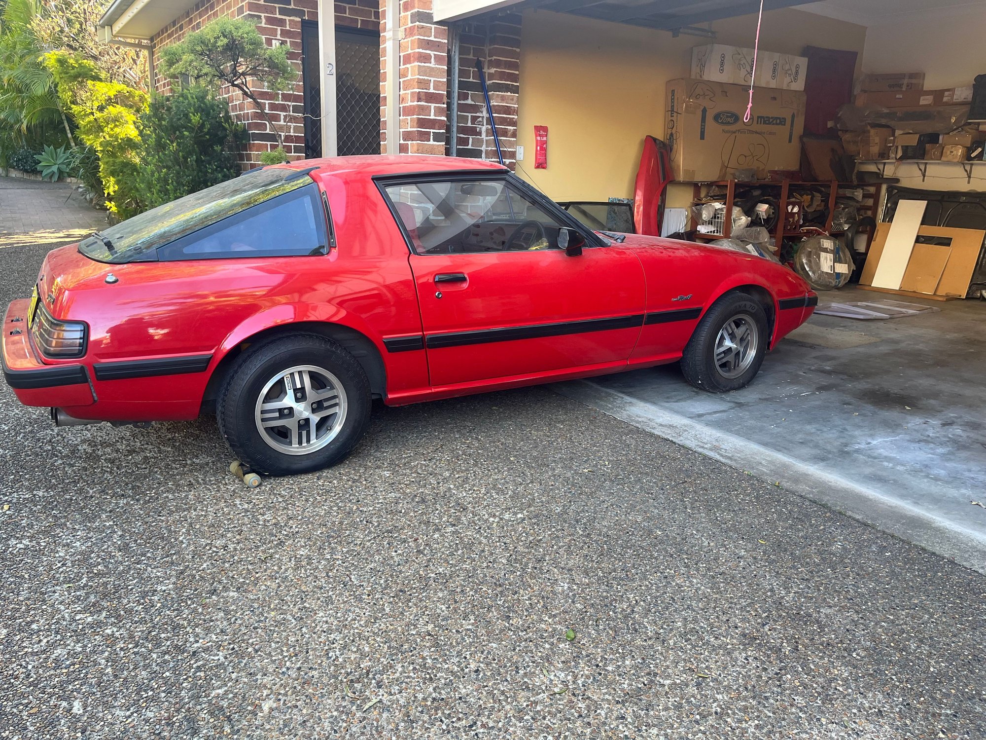 Mazda RX7 1980 model which is a very early Series 2.  The car is in very original condition with no rust.  It is undergoing engine rebuild using machined down 13B housings, lightened rotors, lightened flywheel, sports exhaust and renewed breaks.  The car has Koni yellow shocks and Lovells springs and rides well.