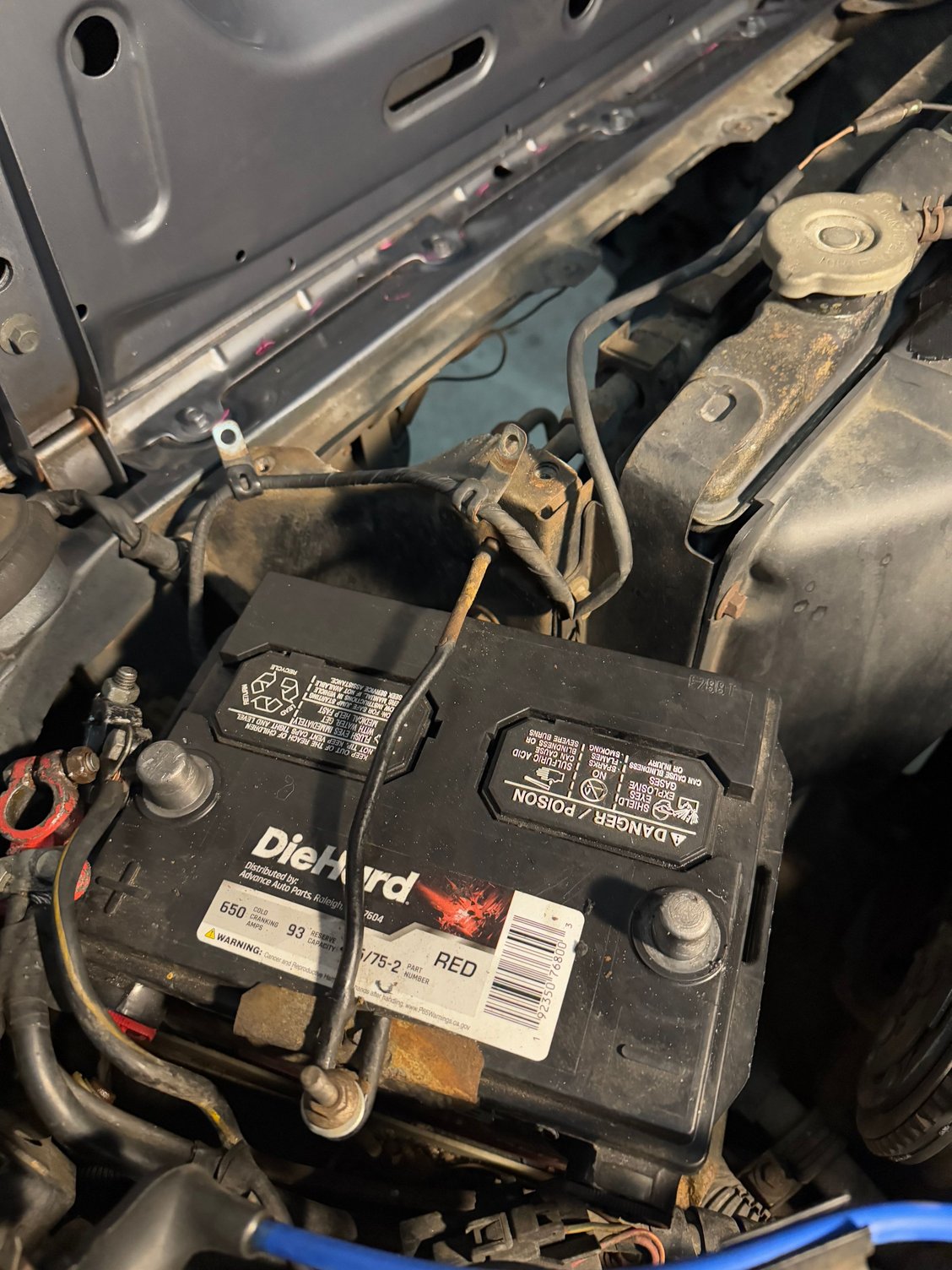 Un-hooked the battery and removed it for some space and a good time to clean the under tray.