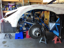 13 x 1.25 rotors with massive 4 piston calipers on a car weighing around 2000 pounds or less  should work well.
