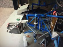 The crash box is made of aluminum and attached with pull out pip pins. Top duct is for engine