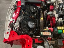 Cooling system in. Mishimoto radiator. I kept the oem fan shroud but replaced the original 2 speed fans with 2 12” single speed flex-a-lite fans. 