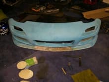(AFTER, but not finished) New/old front bumper! Did some cutting and fiberglass work on the bottom.  Ill add some before pics soon.