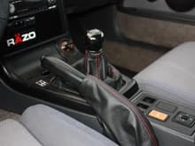 Razo Super-low shift knob, Redline goods shift boot and e-brake covers. http://www.redlinegoods.com