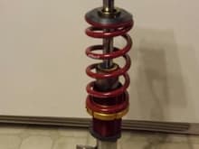 Cleaned and polished strut tube with new Koni yellow adjustable damper (for rear '86 MR-2), Ground Control camber/caster plate and Eibach 300lb spring rate spring. Strut tube has since had spindle body, brake retainer and coil over collar/perch powder coated &quot;wagon&quot; red while keeping the tube polished. Final coat of clear powder applied to keep tube from oxidizing.