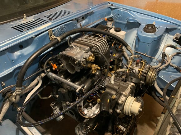 This is the bigger news. Intake has been bolted on. Atkins sleeves installed. Fuel circuit on the engine is ran. Coolant line for turbo is in place. I will need to add the banjo fittings once the real turbo is in place.  