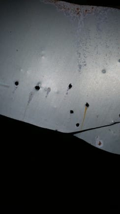 Found some pinholes in my gas tank, this is the back side of the piece that I cut out