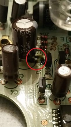 1,000uF Capacitor leakage within red circle.