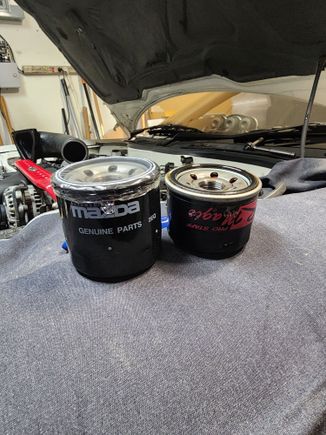 The R Magic filter is shorter than factory, most likely because of the raised pedestal for the oil pressure and temp sensors