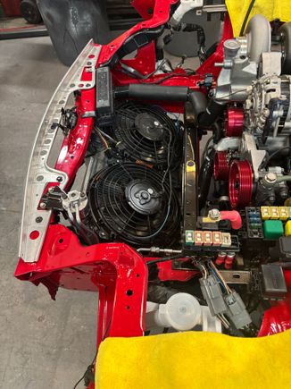 Cooling system in. Mishimoto radiator. I kept the oem fan shroud but replaced the original 2 speed fans with 2 12” single speed flex-a-lite fans. 