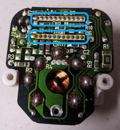 Remove/replace solder from the rear of the PCB. The highlighted sections are the pins to IC1.