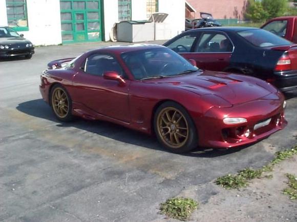 i painted the rims gold, the car looked this way for one summer.  the front bumper, rear bumper, mirrors, and fender inserts did not match at all.  the painter painted the car and then finished the rest 2 months later.  clearly temperature was colder and he missed a coat or two of the orange metallic.