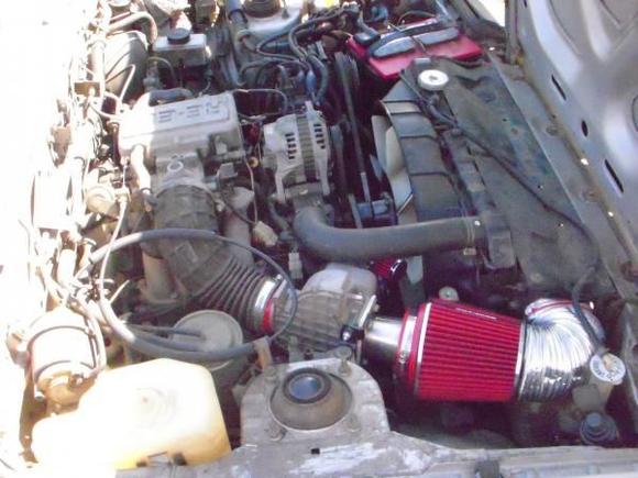 my new intake, kind of a short ram, still uses the airdamn, and still have the airpump just with a small breather filter