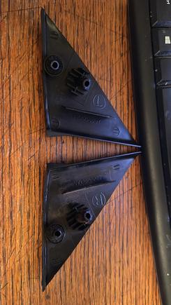 Removed triangles showing typical damage to mounting posts.