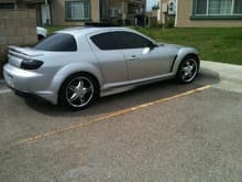 My 2004 Mazda RX-8 with the limo tint, smoked tail lights, and the 18&quot; BZO's! and reppin that SOLIZ emblem haha