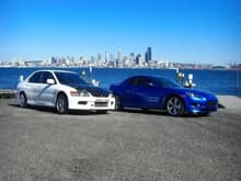 The 8 and the Evo with the beautiful Seattle skyline
