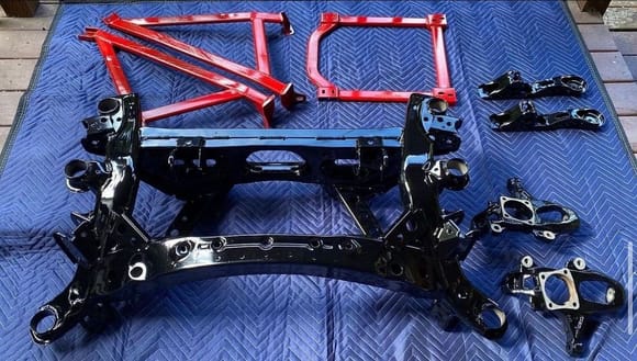 Subframe, front knuckles and some of the AutoEXE bracing all powder coated.