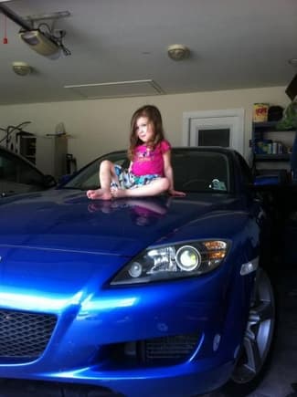 Taylor on the hood! She loves her &quot;blue car&quot;!