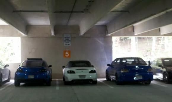 group of guys from my college. from left to right: my rx8, honda s2000 (exhaust and intake mods), Evo 8 (turbo'd w/many mods:  450hp), Dodge Neon (turbo'd: ???hp)