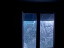 That was the view out my bedroom window after the big 4 footer snowstorm we got. I remember when the plow company was clearing the snow the loader they were using had tires almost as big as my house. I don’t mind the snow it’s the cold.