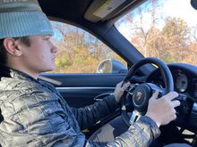 Benjamin warming up the car for the oil change