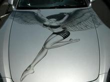 040605 Birdgirl on hood.JPG