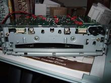 Showing 2 front screws to remove main circuit board
