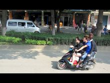 IMG_4132 three teens AND two bags of rice.JPG