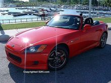 red with gunmetal stock rims.jpg