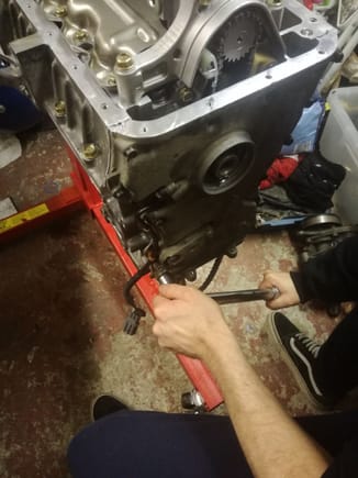 Honda bond , quick work again squirt it on assemble all in five mins , we did this together twirling in the bolts finger tight then torquing them tight.