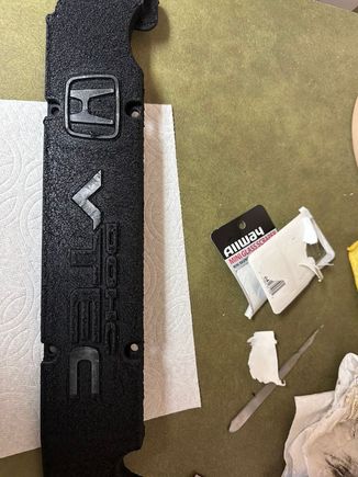 Careful sanding around the letters. 