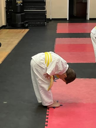 Cole takes the bowing at karate class seriously. 