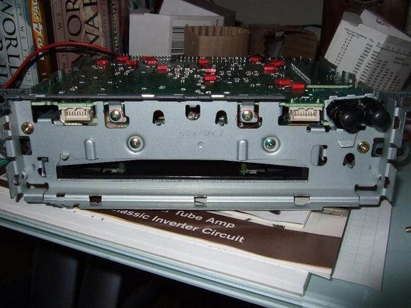 Showing 2 front screws to remove main circuit board