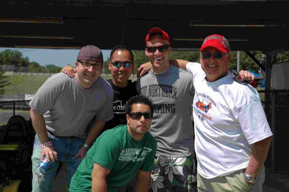 The crew with their driving coach, Jim.