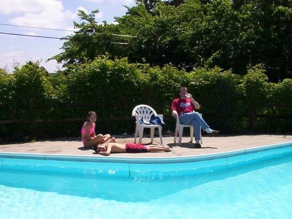 Don, Alexa and Ethan by the pool.JPG