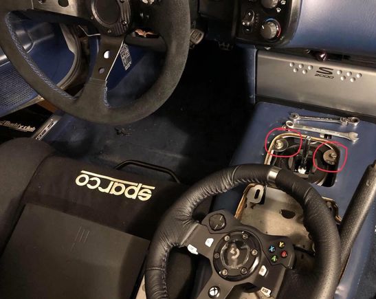 the red circles show how the gear shift is held in place. 

The controller off to side ended up being a distraction. Like texting and driving lol. 
