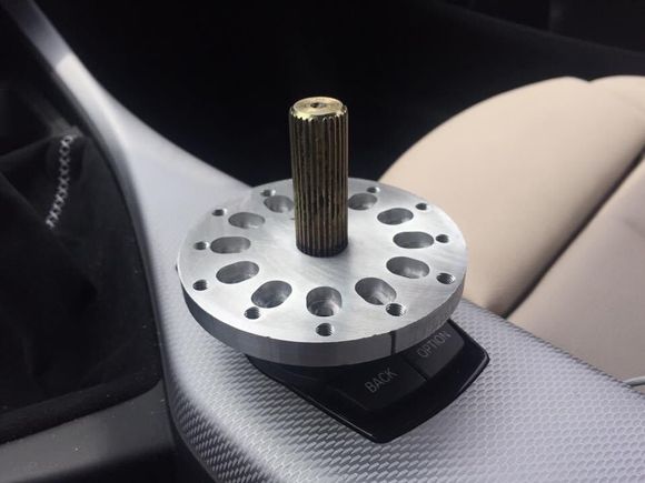 My G27 hub adapter came back from the machine shop. They pressed in the end of the steering shaft for me. 