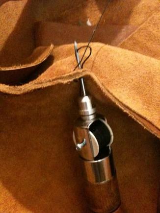 i hand stitched the pieces because i dont have a sewing machine. i used an AWL.