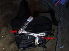 The seat belt holder and harness needs to be removed from the stock seat. There is an airbag distance sensor on the right front that is part of the harness. It is held in with one screw.