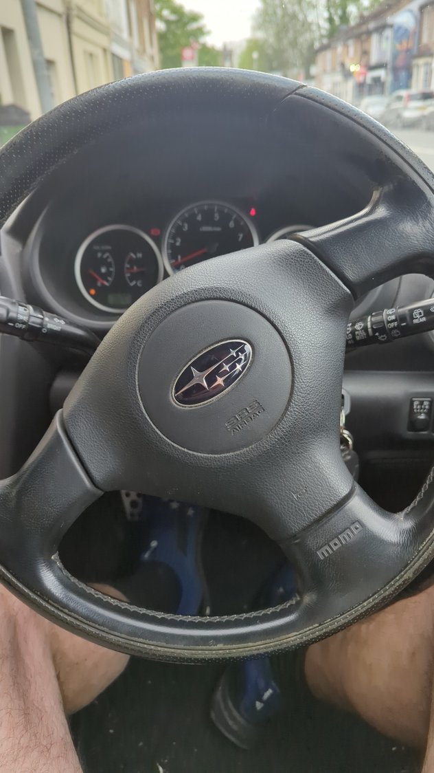 Drives fairly straight but steering wheel a mile off.