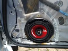 Front speaker with broken plastic ring that was part of the grilles