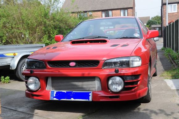 Front end with FMIC, car now has facelift bumper/grille.