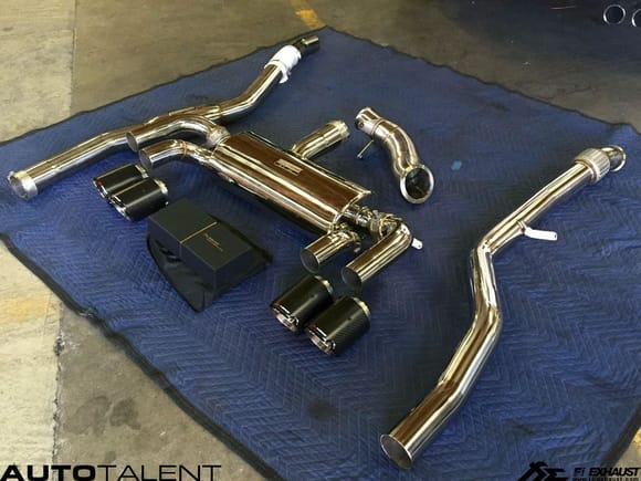 Fi Exhaust for BMW F87 M2 - Full Exhaust System display on the floor.