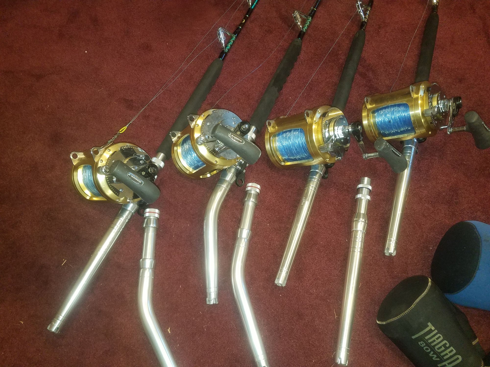 4 Shimano tiagra 80w reels mounted on Fishermans Outfitters short
