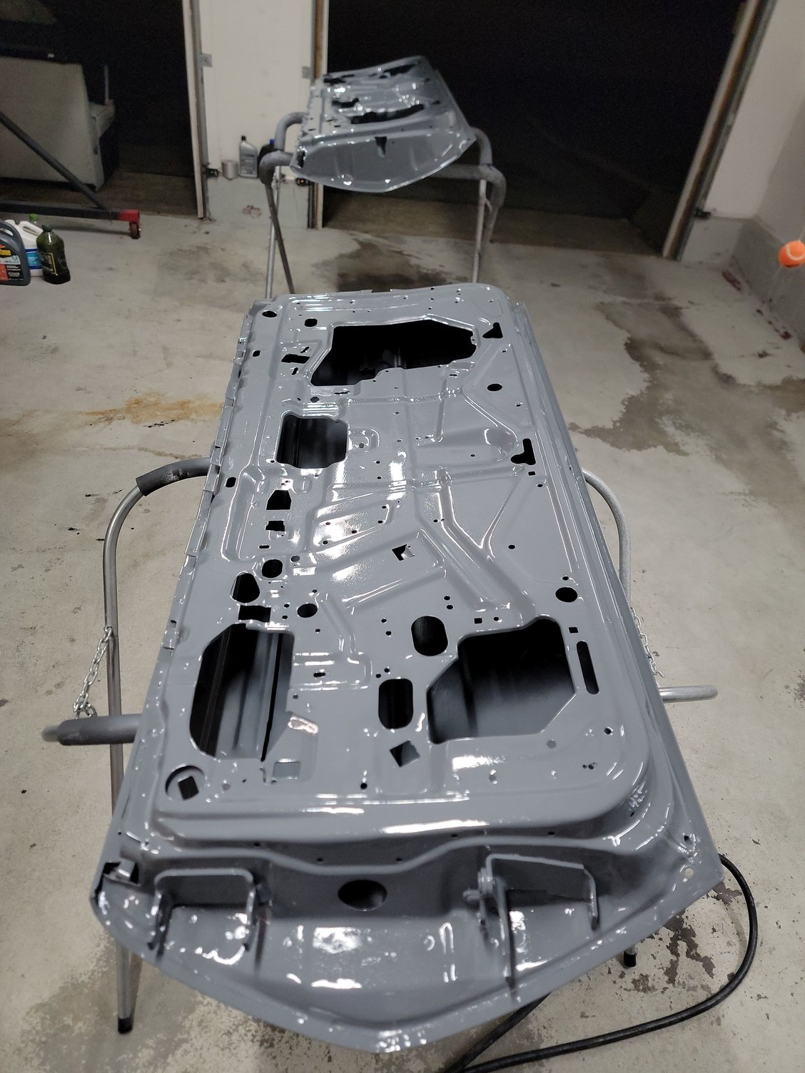 Two coats of Eastwood epoxy primer. I also brushed a bit of rust encapsulator on the internal questionable areas (2 coats).