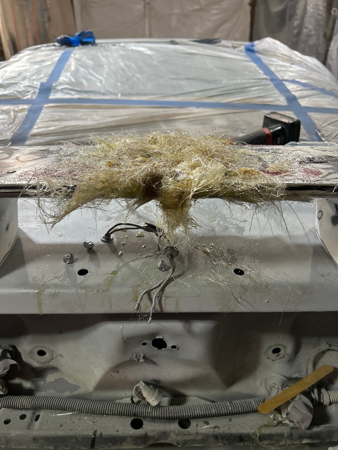 Left the inner braces in after building up valley around bellow them to fill with mesh and fiber glass resin. And some very armature glass work. Time to go sand and see if it�s sturdy. 